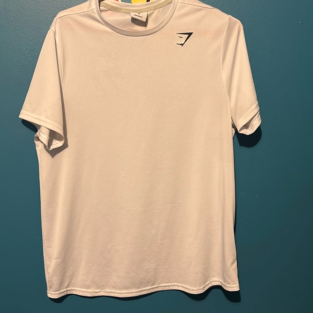 white gym shark shirt
medium